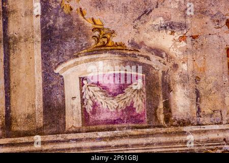 Frescoes on the walls of an old abandoned manor house of the 18th century, a view from the inside. Belkino Manor, Russia Stock Photo