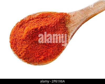 Paprika powder and wooden spoon isolated on white background Stock Photo