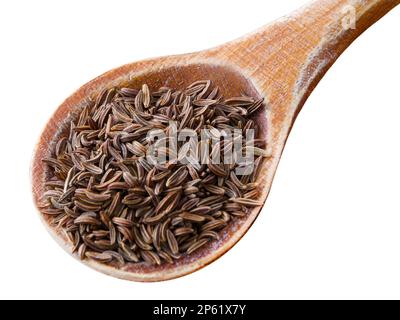 Caraway seeds and wooden spoon isolated on white background Stock Photo