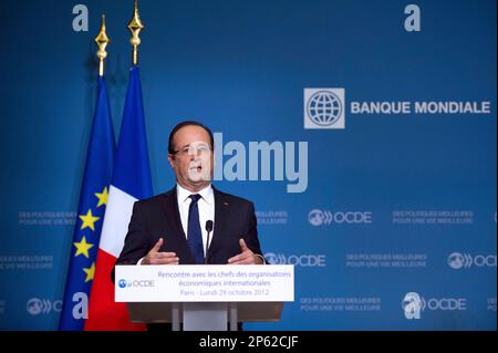 France's President Francois Hollande delivers a speech during a press conference after a general meeting at the OECD headquarters in Paris, Monday Oct. 29, 2012. (AP Photo/Bertrand Langlois, Pool)