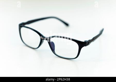 Glasses in the black rim on white background Stock Photo
