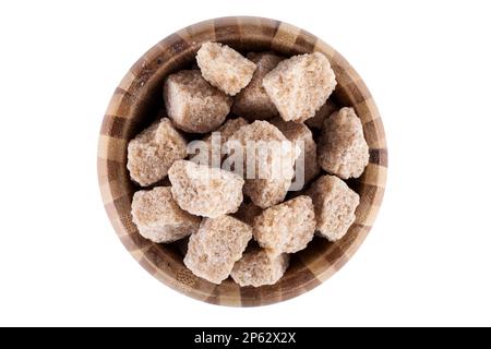 Wooden bowl with brown sugar cubes isolated on white background Stock Photo