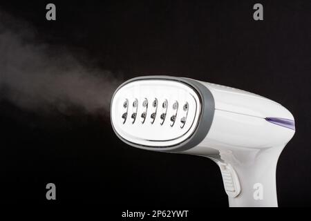 Garment streamer with stream on black background Stock Photo