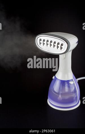 Garment streamer with stream on black background Stock Photo