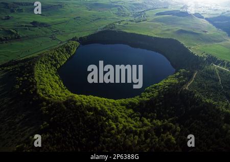 France. Puy-de-Dome (63) Regional Natural Park of the Volcanoes of Auvergne. Aerial view of Lac Pavin. This lake of volcanic origin, formed by pheatom Stock Photo