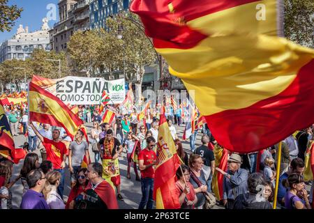 Anti-independence Catalan protestors carry Spanish and catalan flag during  a demonstration for the unity of Spain on the occasion of the Spanish Natio  Stock Photo - Alamy