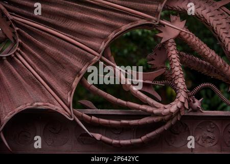 Detail of dragon on iron gate at Pavellons de la Finca Guell, by Antonio Gaudi. Barcelona. Catalonia. Spain Stock Photo