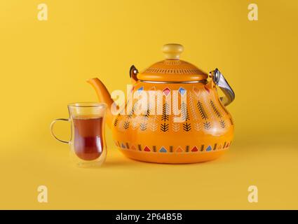 Iconic Arabian fabric is graced with symbols of Arabia, in particular Arabic tea and dates, they symbolise Arabian hospitality, ramadan set Traditiona Stock Photo