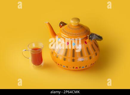 Iconic Arabian fabric is graced with symbols of Arabia, in particular Arabic tea and dates, they symbolise Arabian hospitality, ramadan set Traditiona Stock Photo