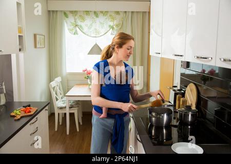 Girl in Breastfeeding Nightgown Staying at the Home Kitchen Stock