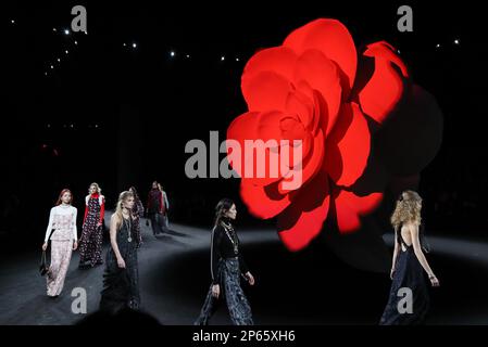 Paris, France. 7th Mar, 2023. Models present creations by French fashion house Chanel as part of its Fall/Winter 2023/2024 pret-a-porter collections during the Paris Fashion Week in Paris, France, March 7, 2023. Credit: Gao Jing/Xinhua/Alamy Live News Stock Photo