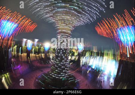 An artistic representation of the OCBC Light and Sound Show which bathes the Supertrees at the Gardens By The Bay, Bay South, in a different kind of light. Located in the Supertree Grove, the OCBC Skyway is an aerial walkway that offers visitors a panoramic view of the Gardens, while the OCBC Light and Sound show is a spectacular combination of music and light artistry that will presented to visitors in two shows every night, at 7:45pm and 8:45pm, starting from 02 July 2012. Photographed 02 July 2012. Can be used with stories about Supertrees, Garden, Marina South, Marina Bay, greenery, botani