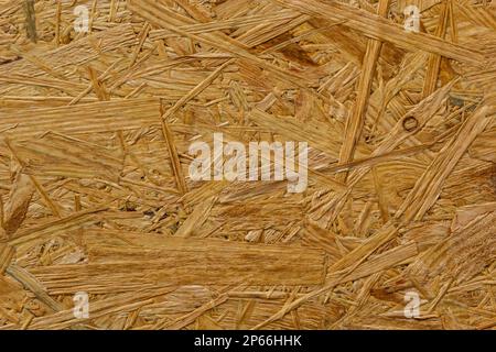 OSB board texture. Brown wooden background. Simple pressed chipboard  pattern. Chip board background. Brown wood texture. High quality photo  14703427 Stock Photo at Vecteezy