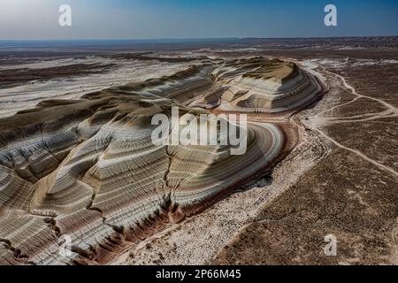 Aerial of multicoloured layers of sandstone, Kyzylkup, Mangystau, Kazakhstan, Central Asia, Asia Stock Photo