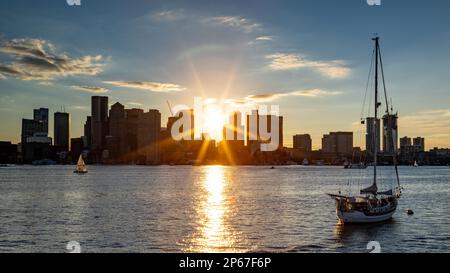 Sun flare over Boston from the East, Boston, Massachusetts, New England, United States of America, North America Stock Photo