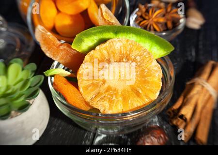 dried pineapple on wood background Stock Photo