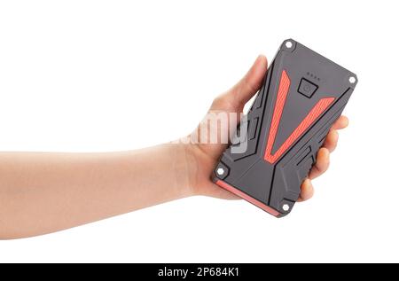powerbank engine jump starter in hand path isolated on white Stock Photo