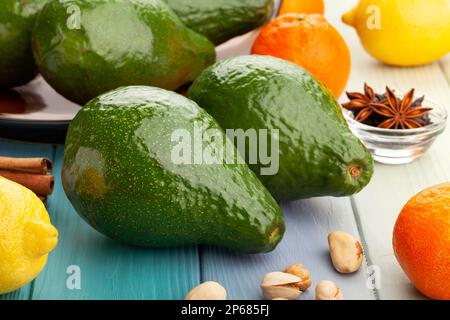 avocado group on wood background Stock Photo