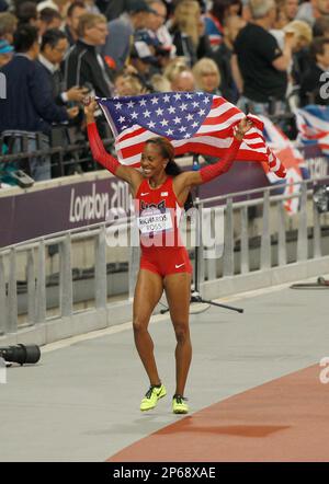 USA's Sanya Richards-Ross celebrates winning the gold medal in the Womens 400m event at the London Olympics on Sunday, August 5, 2012 in London, England (AP Photo/Margaret Bowles)