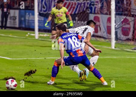 Goalmouth action in Thai premier league football match, Port F.C. playing at PAT Stadium, Bangkok, Thailand Stock Photo