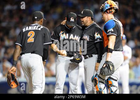 Miami Marlins Manager Ozzie Guillen comes off the mound at the new Miami  Marlins Ball Park in the second exhibition game against the New York  Yankees April 2, 2012, in Miami, Florida.