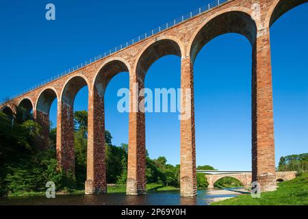 Summer daytime view of The Leaderfoot Viaduct over the River Tweed near Melrose in the Scottish Borders in Scotland, United Kingdom Stock Photo