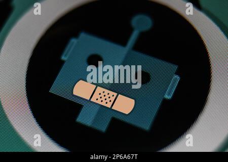 ChatGPT artificial intelligence chatbot icon with band aid in its mouse on computer screen Stock Photo