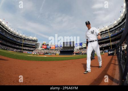 New York Yankees Outfielder Nick Swisher (#33) heads to first. The