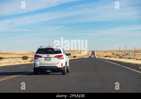 A picture of a white KIA Sorento GDI driving in Arizona. Stock Photo
