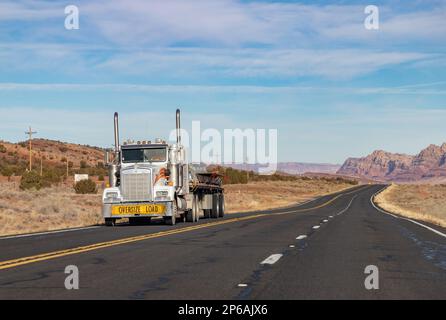 A picture of a cargo truck driving in U.S. Route 89 in Arizona. Stock Photo