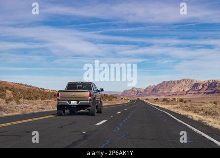 A picture of a RAM 1500 Laramie 4x4 driving in Arizona. Stock Photo