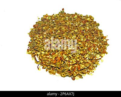 shredded and dried oregano isolated on white Stock Photo