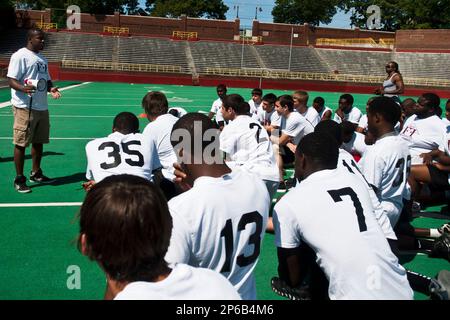 Former Flint football star Chris Wilson to coach city's only high school  team