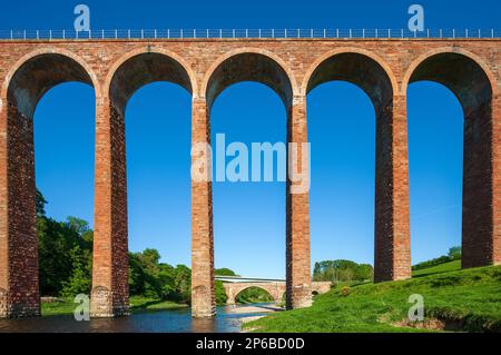 Summer daytime view of The Leaderfoot Viaduct over the River Tweed near Melrose in the Scottish Borders in Scotland, United Kingdom Stock Photo