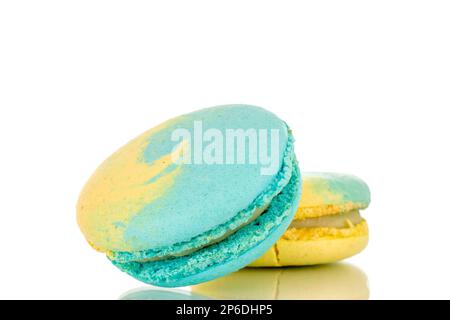 Two confectionery products, sweet macaroons, macro, isolated on white background. Stock Photo