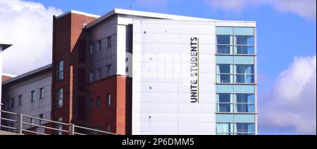 An accommodation block, named 'Piccadilly Point', with 'Unite Students' sign on the side in Manchester, UK Stock Photo
