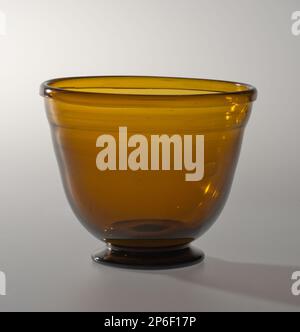 Maker Unknown, Bowl, 19th century, amber glass. Stock Photo