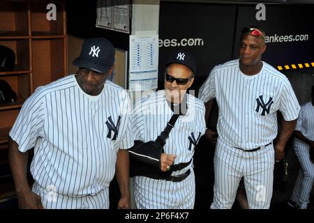 Former New York Yankees pitcher Dwight Doc Gooden, manager Joe Torre and  outfielder Darryl Strawberry during Old Timers Day at Yankee Stadium on  June 26, 2011 in Bronx, NY. (AP Photo/Tomasso DeRosa