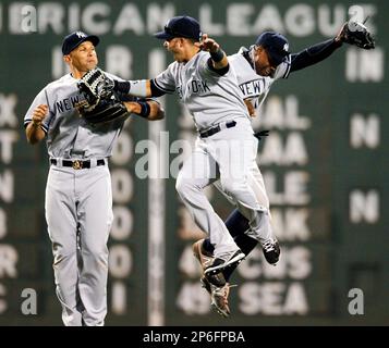 Baltimore Orioles outfielders Felix Pie, Nick Markakis (21) and Adam Jones  (10) celebrate after the Orioles defeated the New York Yankees 6-2 in a  baseball game Tuesday, Sept. 7, 2010, at Yankee