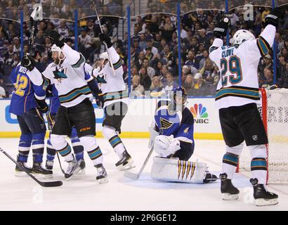 From left to right, San Jose Sharks center Tomas Hertl, left wing Alexander  Barabanov (94), right wing Timo Meier and center Logan Couture (39)  celebrate a goal by defenseman Erik Karlsson (obscured)