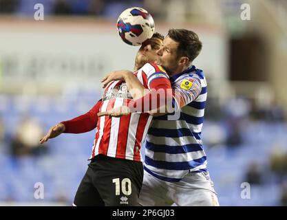 Reading, England, 7th March 2023.  Billy Sharp of Sheffield Utd and Scott Dann of Reading during the Sky Bet Championship match at the Select Car Leasing Stadium, Reading. Picture credit should read: Paul Terry / Sportimage Stock Photo