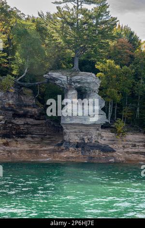 Munising, Michigan. Chapel Rock in the Pictured Rocks National Lakeshore on Lake Superior in the Upper Peninsula of Michigan. The colors in the cliffs Stock Photo
