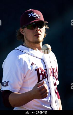 Luke Voit #30 of the Missouri State Bears follows through his swing after  making contact on a pitch during a game against the Wichita State Shockers  at Hammons Field on May 5