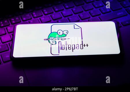 In this photo illustration, the Notepad++ logo seen displayed on a ...