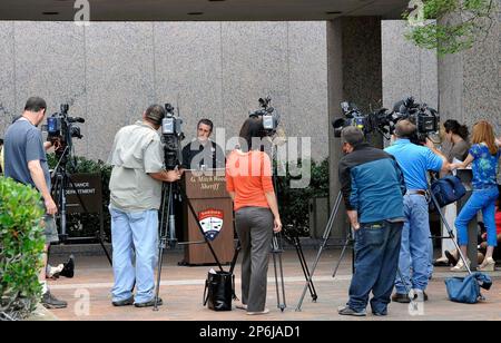 Jefferson County Sheriff Mitch Woods center meets the local media