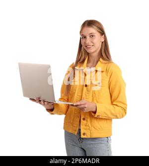 Teenage student using laptop on white background Stock Photo