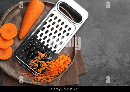 Wooden cabbage grater, piece of cabbage, carrot, assorted pepper and  himalayan salt on cutting board and on blue wooden table. Flat lay with  cabbage f Stock Photo - Alamy