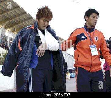 Japan s Ryohei Yamazaki L is transferred to a hospital after he