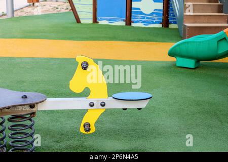 Spring rocker on children's playground Stock Photo