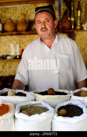 A colorful spice shop at the old bazaar in  the old city Bukhara, Uzbekistan. Stock Photo